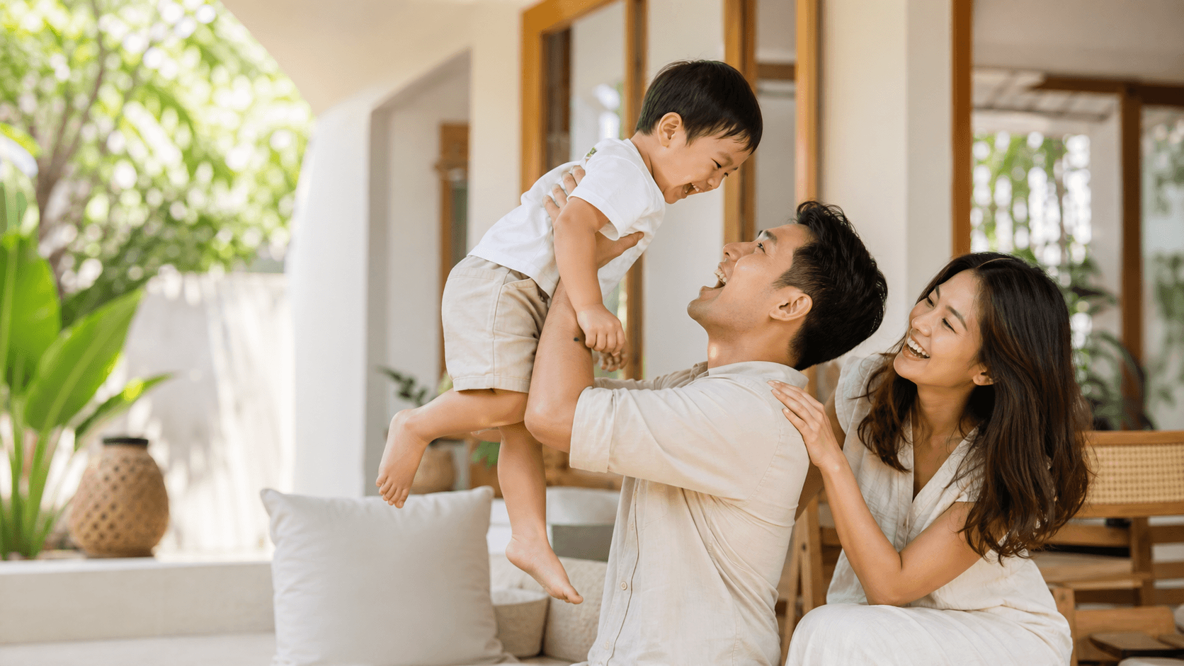 A young Chinese Indonesian family enjoying time together at home
